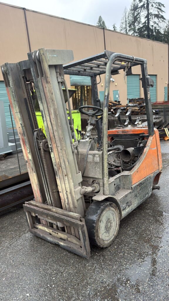 Scrap forklift removal in Vancouver - retired warehouse forklift ready for pickup
